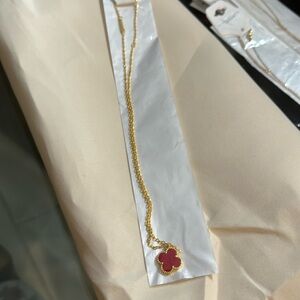 Brand new red clover necklace in gold color necklace